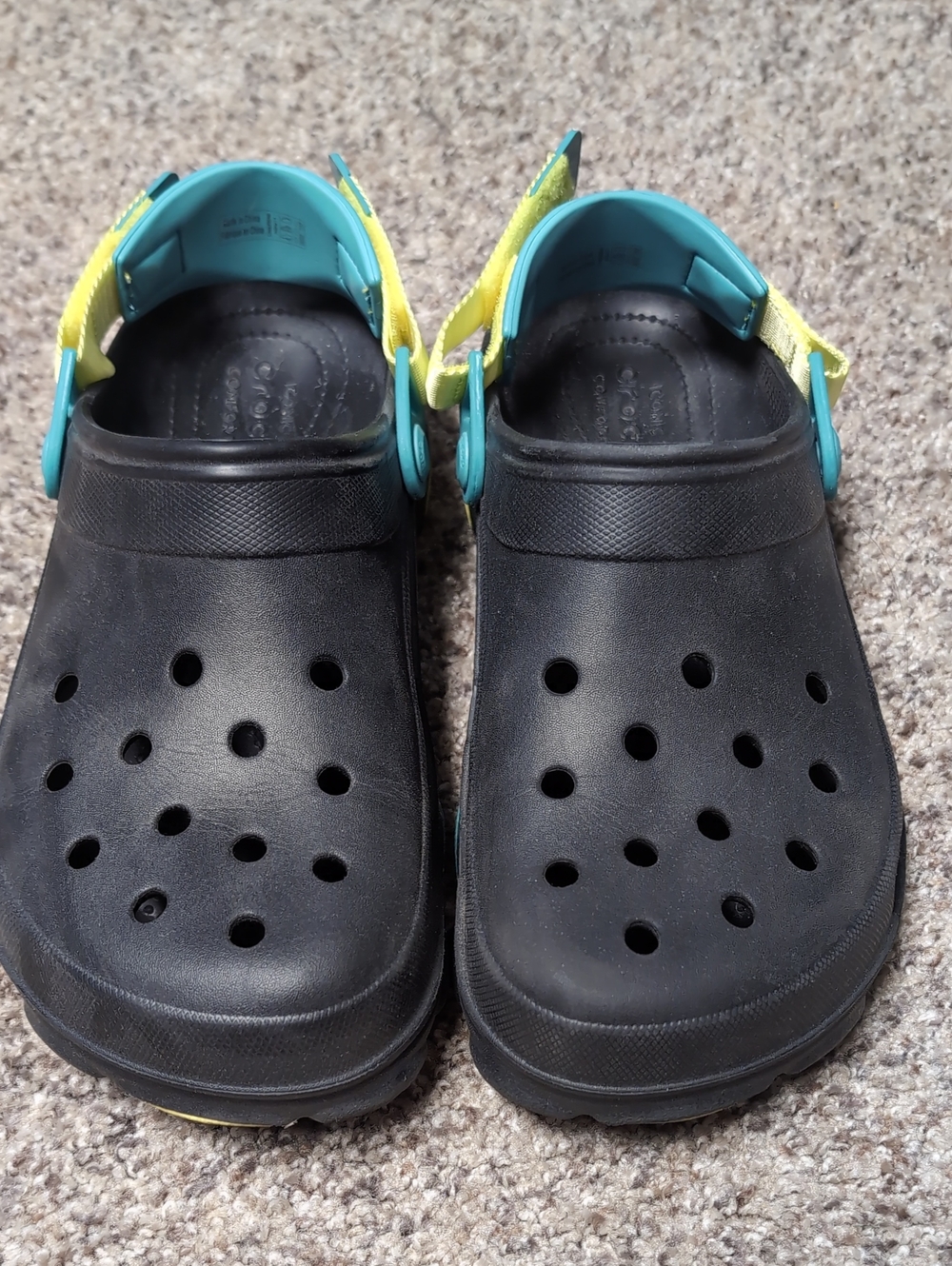 CROCS Black Clogs with Teal and Yellow Adjustable Strap